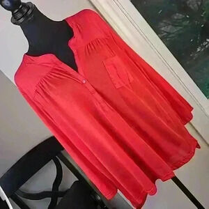 Red button front polo neck tunic